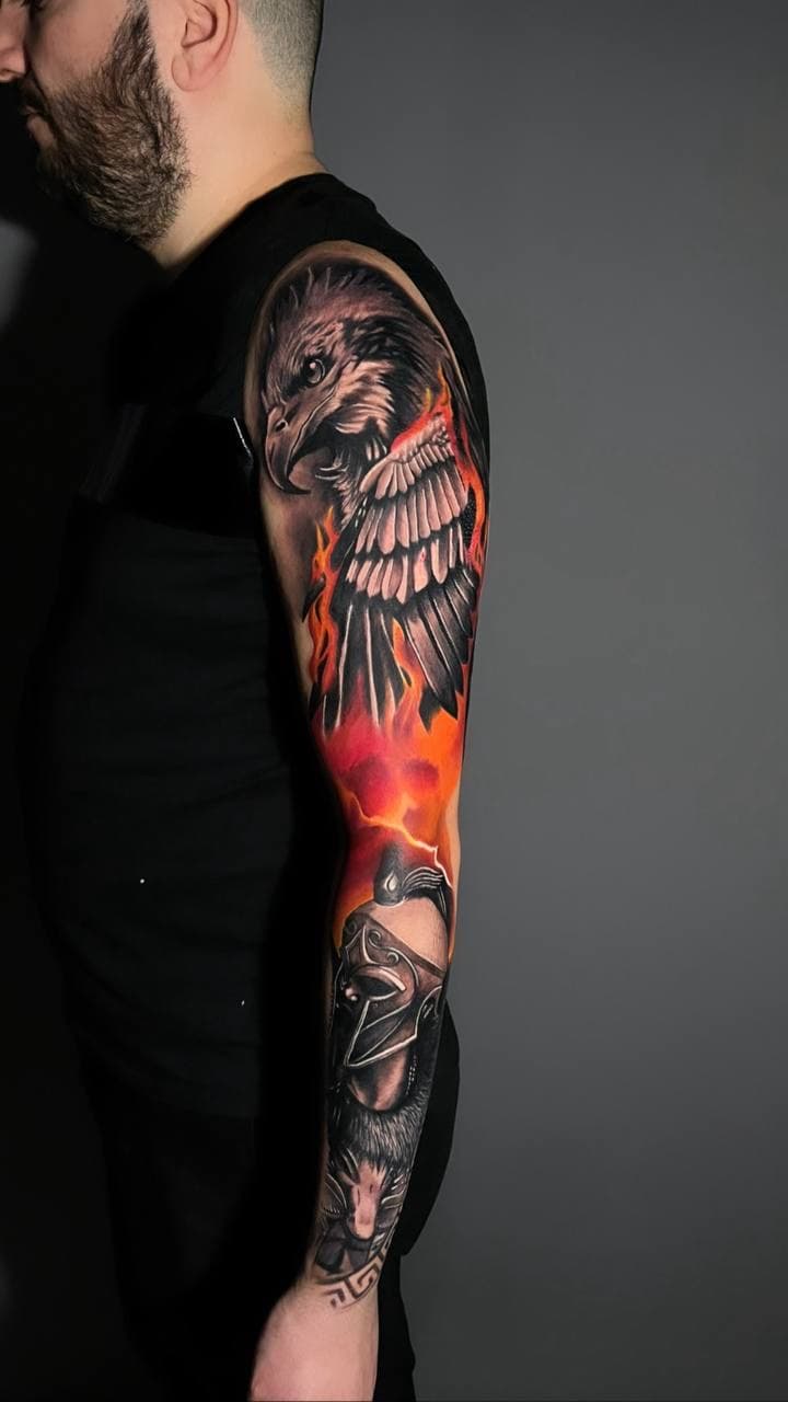 Color realism eagle and flames sleeve tattoo with a Spartan warrior